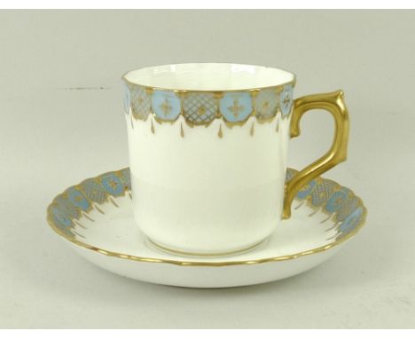 A set of eight Royal Crown Derby coffee cans and saucers, decorated with pale blue borders with gilded detail, circa 1953. (1