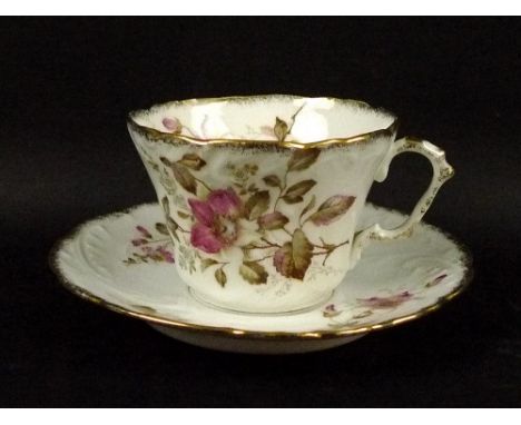 A Springer and Co, Elboyen part tea service, pattern number 6852, decorated with briar roses and gilded borders, comprising s