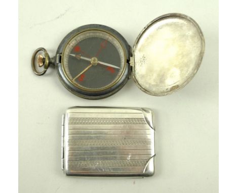 A silver vesta case with machine engraved decoration, and a 1930s wartime compass. (2)