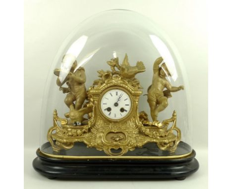 A French figural mantel clock, 19th century, the cast gilt spelter modelled with dancing cherubs and birds, by P. H. Mourey, 