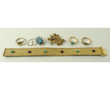 AMENDED DESCRIPTION & ESTIMATES
An 18ct gold foliate design brooch, set with eleven red stones, possible rubies, maker C&F, L