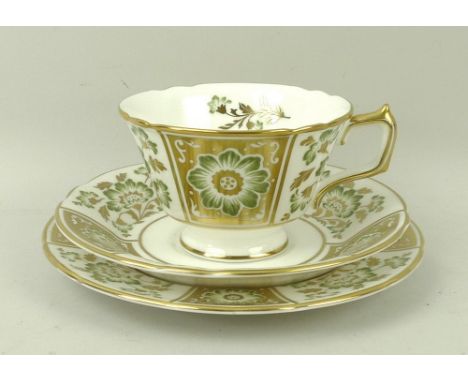 A Royal Crown Derby part tea service, in the Green Derby Panel pattern, comprising a cake plate, milk jug, sugar bowl, and si