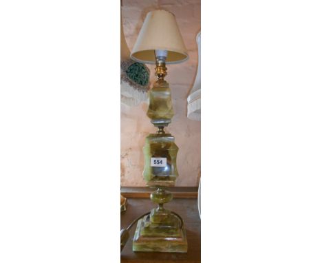 A vintage onyx table lamp of faceted column form, with brass fittings - sold with shade