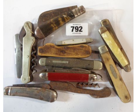 A bag containing a large quantity of vintage flip knives and mutli tools