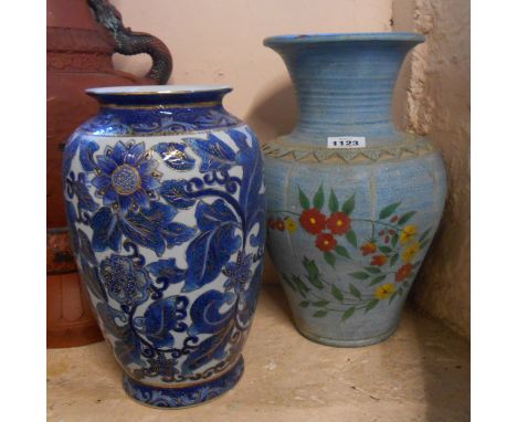 A large ceramic vase with painted floral decoration - sold with a modern Chinese porcelain similar