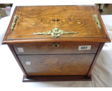 A late 19th Century walnut and strung stationery box with floral inlaid decoration and ormolu fittings, the interior fitted w