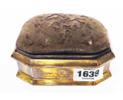 A silver gilt trinket box with remains of pin cushion top, canted corners and N.S. initials to front - London 1910