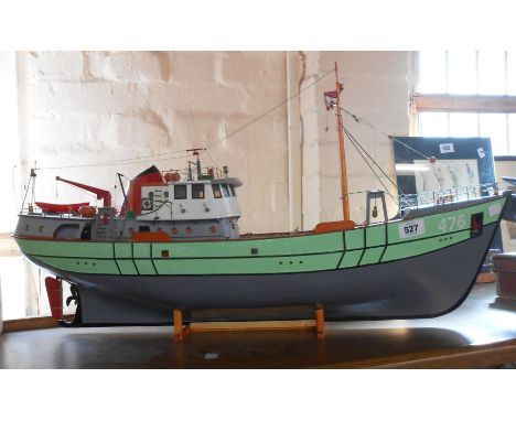 A model of the Nordkap '476' a typical 1970's North Sea fishing trawler with lime green and gray finish to hull (a/f) - stand