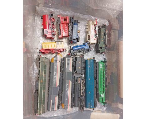 A crate containing a quantity of Triang and other 00 gauge model railway engines, including tank engines, and diesel locomoti