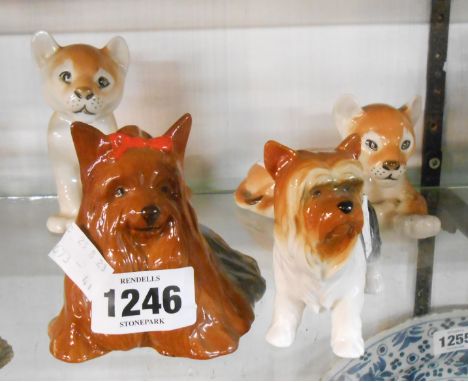 A Beswick Yorkshire Terrier figurine No 1944, a similar 'Best of Breed' model - sold with two USSR Lomonosov lion cub figurin