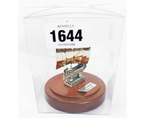 A small Continental marked 'silver 950' model of a ship of Kyrinia, set on polished wood socle - boxed