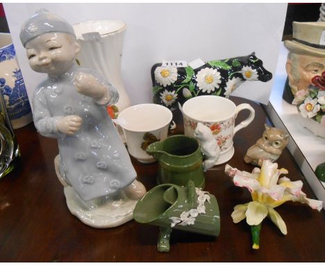 A quantity of assorted ceramic items including Floral Parade cow figurine, etc.