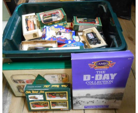 A crate containing a large quantity of boxed model cars including Corgi models, a Mr Blobby truck, etc.