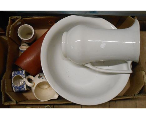 A box containing a small quantity of ceramic items - sold with a pair of old leather gaiters