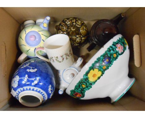 A box containing a quantity of assorted ceramic items including SylvaC chutney face pot, Chinese prunus ginger jar, etc.