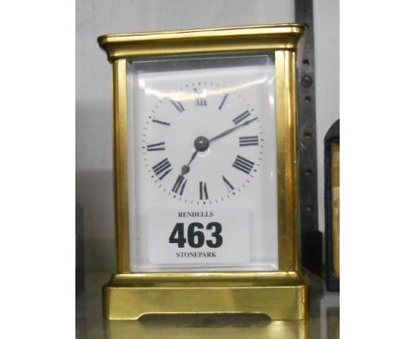 A vintage brass and bevelled glass cased carriage timepiece with platform escapement, with Lion brand eight day movement