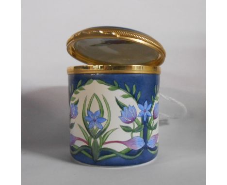 A Moorcroft enamel lift-top trinket box with printed marks to base and dated 2001 - sold with original presentation box