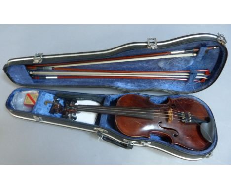 A violin, the two piece figured back with conforming ribs and table of narrow to medium grain, length of back 36cm; together 