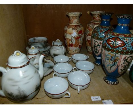 A Japanese eggshell china tea service comprising teapot, lidded sugar bowl, lidded milk jug, cups, saucers, side plates and a