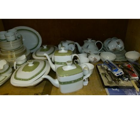 A Royal Doulton Rondelay dinner service with three sizes of plates, teapot, coffee pot, sugar and cream, tea cups and saucers