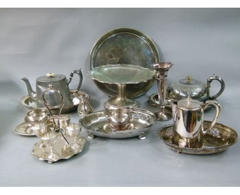 A quantity of silver plated ware including teapot, hot water jug, entree dishes and covers, cake basket, compote, four egg cr