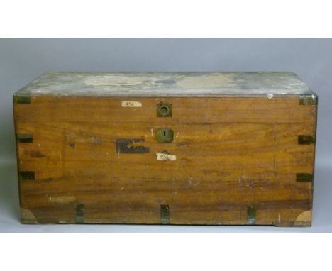 A late 19th century brass bound camphor trunk with pair of carrying handles the front with recessed brass ring pull handle an