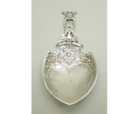 A large continental silver caddy spoon, London import mark for 1902, 79g, 75mm x 143mm 