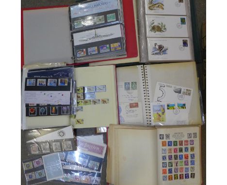 A collection of stamps; British presentation packs, assorted covers, two Stamp of the World album books 1966, one album of bi