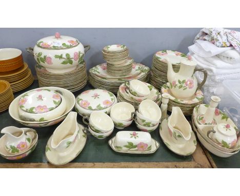 A large collection of Franciscan dinner and teawares by Johnson Bros., including 15 dinner, 9 side,16 tea plates, soup tureen