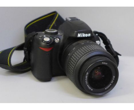 A Nikon D60 digital camera with a Nikon DX 18-55mm lens 