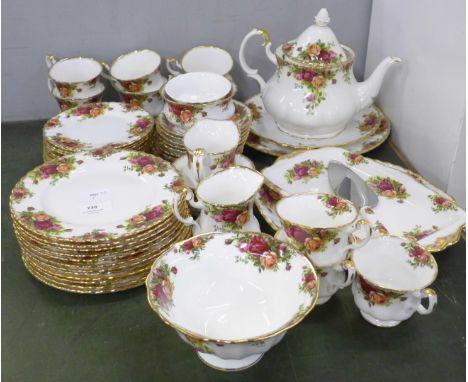 A collection of Royal Albert Old Country Roses; teapot, twelve small plates, twelve side plates, nine saucers, nine tea cups,