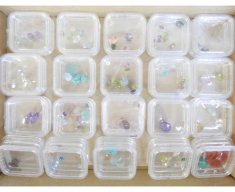 A quantity of loose gemstones including Ethiopian opal, amethyst, garnets, etc. 