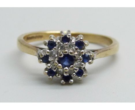 A 9ct gold, sapphire and diamond cluster ring, 1.9g, J/K 