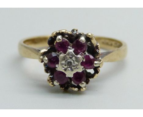 A 9ct gold, diamond and ruby ring, 2.5g, N 