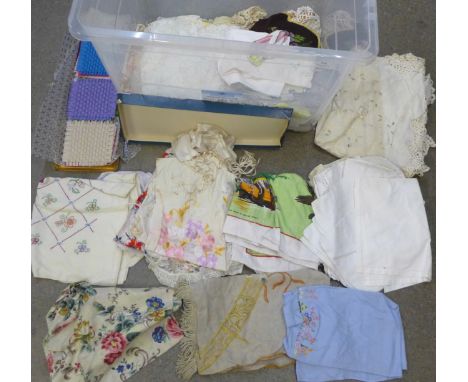 A box of vintage embroidered linen, table cloths, etc., lace edged and crochet work 