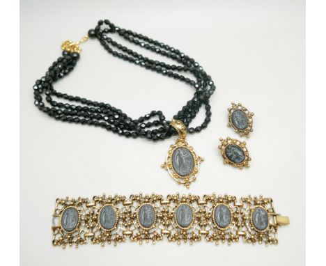 A vintage Napier black cameo jewellery set, (necklace, bracelet and earrings) 