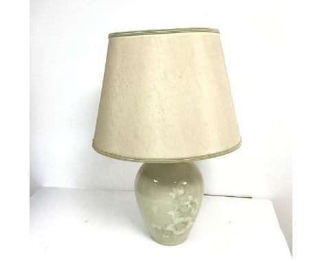 A ceramic table lamp with floral decoration complete with shade (h.60cm)