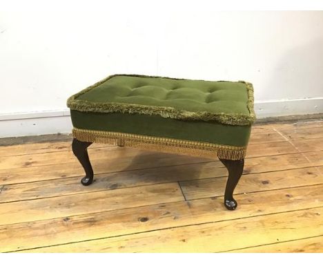 A reproduction Georgian style footstool, with upholstered button padded top, with cabriole legs and pad feet (32cm x 57cm x 3
