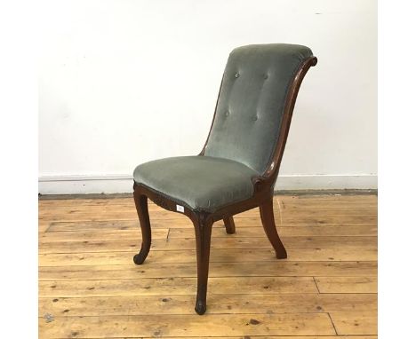 A 19thc rosewood side chair in the French taste, the scroll back with button upholstery above a moulded seat rail, on cabriol