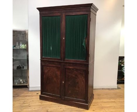 Harewood House interest: a late George III mahogany and ebony lined cabinet, the projecting cornice above a pair of panelled 