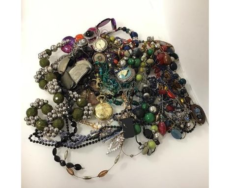 A large assortment of costume jewellery including paste and glass beads, pocket watches, necklaces, earrings, etc. (a lot)