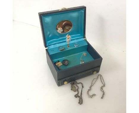 A silver fancy link chain (13.82g) and a white metal chain with a Daniel Stewarts College charm, won by Dean House for the Re