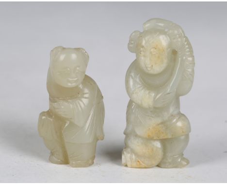 A group of three Chinese celadon jade pendant carvings of boys, probably Qing dynasty, heights 6.5cm, 5.2cm and 5.2cm (one ch