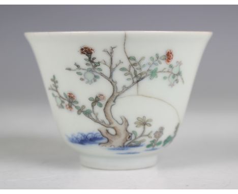 A Chinese famille verte 'month' wine cup/teabowl, mark of Kangxi and possibly of the period, of steep-sided 'U' form, one sid