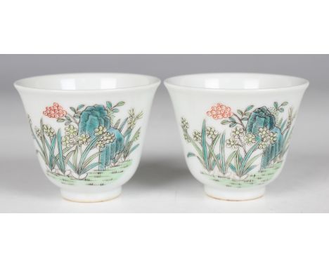 A pair of Chinese famille verte export porcelain wine cups, mark of Guangxu but 20th century or later, each painted with two 