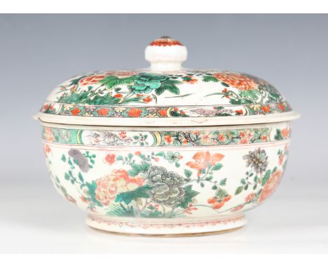 A Chinese famille verte porcelain circular tureen and cover, Kangxi period, the bowl exterior and cover painted with four gro