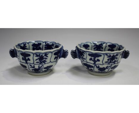 A pair of Chinese blue and white porcelain cups, mark of Yongzheng but 20th century, of circular form with slightly flared lo