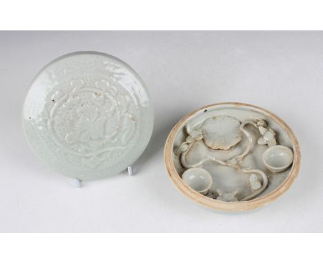 A Chinese Qingbai style lotus cosmetics box and cover of circular form, the slightly domed cover moulded in low relief with l