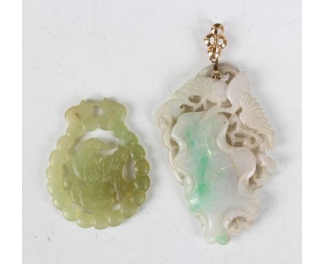 A Chinese jade pendant, early 20th century, carved and pierced with a crane and lotus leaf with scrolling stem, length 7.2cm 