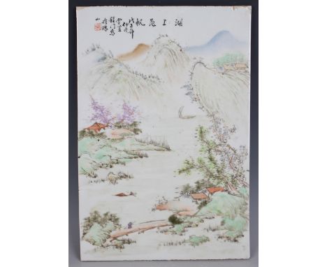 A Chinese porcelain rectangular plaque, 20th century, painted with a mountainous lakeside landscape with pavilions and fisher